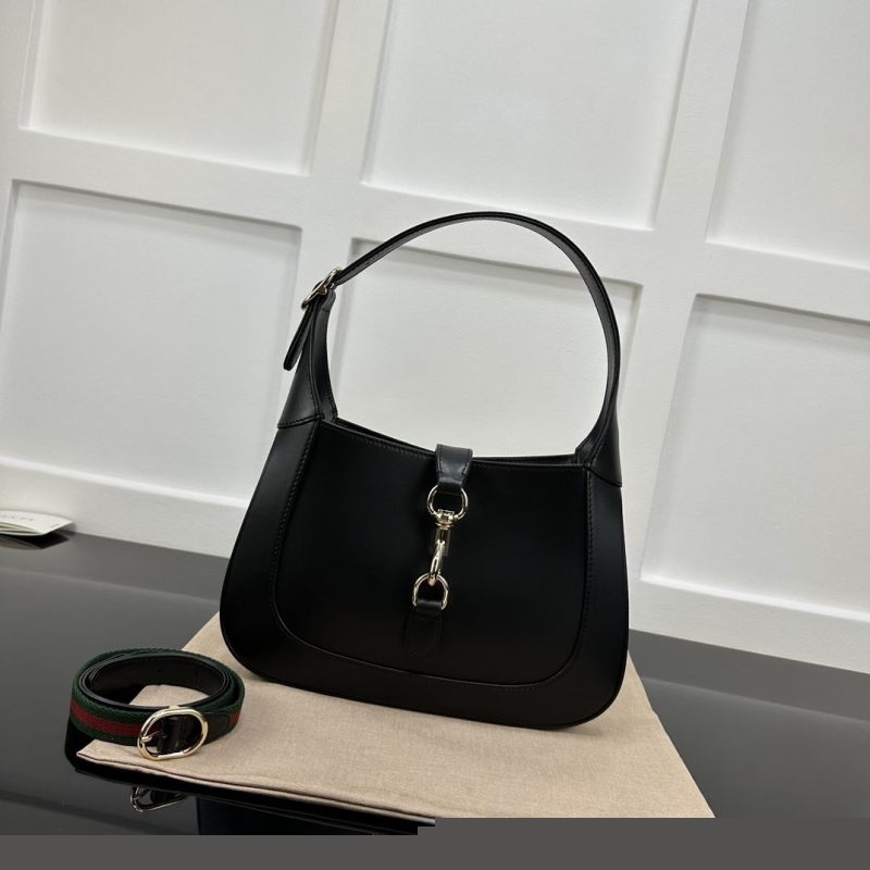 G*u*i top handle bags